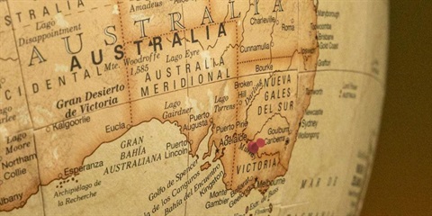Close-up of a globe showing Australia and a pin in the Swan Hill region.